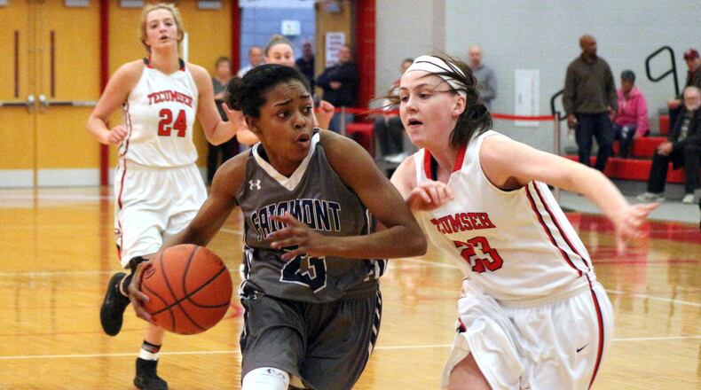 Fairmont’s Makira Webster (left) drives at Tecumseh’s Terah Harness defends in the Firebirds’ 50-35 victory in the Division I sectional final at Troy High School on Monday. GREG BILLING / CONTRIBUTED