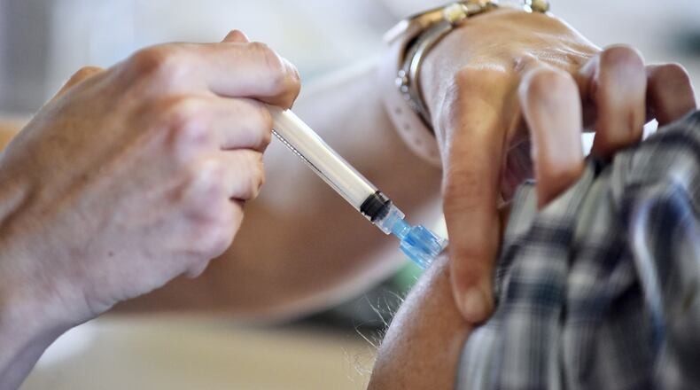 About 3.81 million people in the state have received their first booster shot, and 1 million have received a second booster. NICK GRAHAM / STAFF FILE