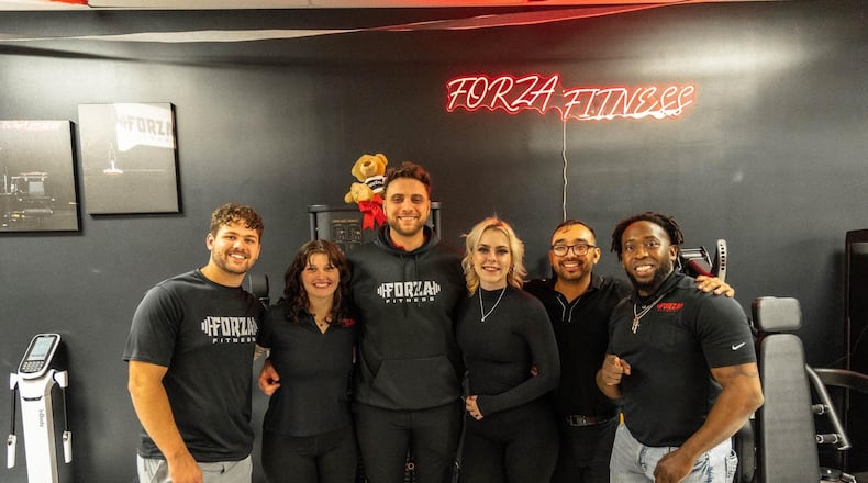 The Forza Fitness team include owner Dominick Anastasio and operations manager Rachel Golem (center). They opened a second location at 222 W. Central Ave. in Springboro, in addition to the original gym at 3012 Far Hills Ave. in Kettering at the Oakwood border. CONTRIBUTED