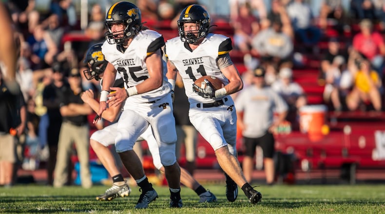 Shawnee High School senior Ed Boehmer runs the ball during their game against Tecumseh on Friday night at Spitzer Stadium in New Carlisle. The Braves won 42-14. Michael Cooper/CONTRIBUTED