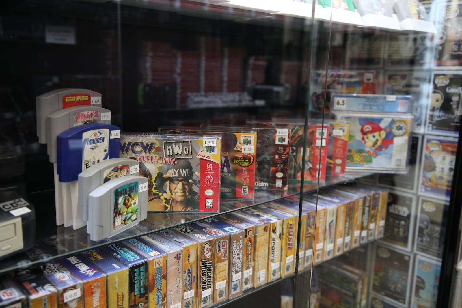 One of the Nintendo 64 cartridge shelves at Vacuums and Video Games. BRANDON BERRY/CONTRIBUTED