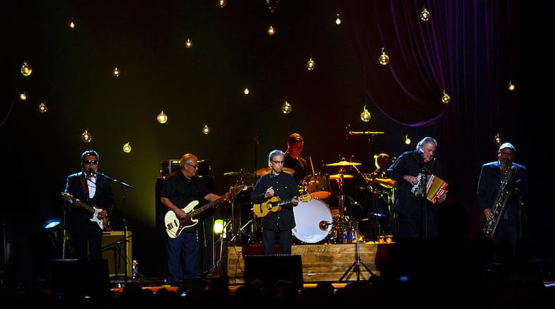 LOS ANGELES, CA - FEBRUARY 06:  (L-R) Musicians Cesar Rosas, Conrad Lozano, Louie Perez, David Hidalgo and Steve Berlin of Los Lobos perform onstage at the 25th anniversary MusiCares 2015 Person Of The Year Gala honoring Bob Dylan at the Los Angeles Convention Center on February 6, 2015 in Los Angeles, California. The annual benefit raises critical funds for MusiCares' Emergency Financial Assistance and Addiction Recovery programs.  (Photo by Frazer Harrison/Getty Images)