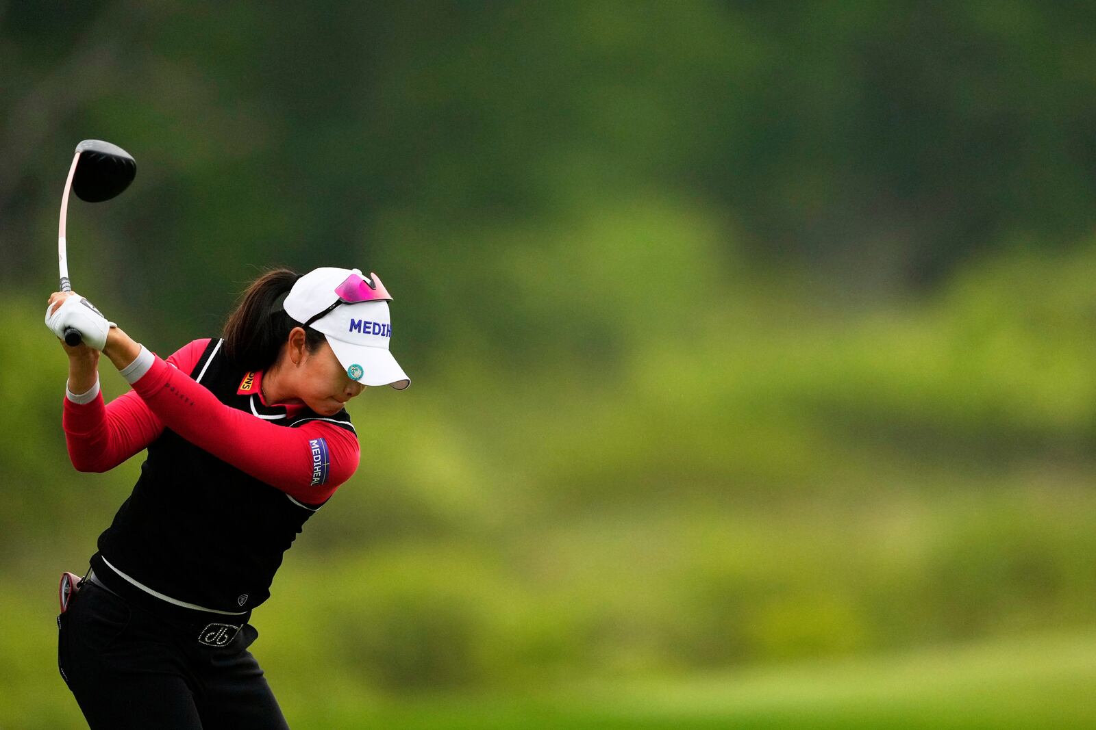 A Lim Kim, of South Korea, hits from the third tee during the second round of the U.S. Women's Open golf tournament at Erin Hills Friday, May 30, 2025, in Erin, Wis. (AP Photo/Matt York)