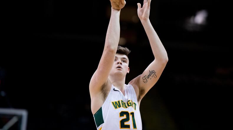 Wright State’s Grant Basile battles for a rebound against Western Kentucky at the Nutter Center on Tuesday, Dec. 3, 2019. Joseph Craven/WSU Athletics