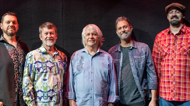 Country rockers Pure Prairie League, (left to right) Scott Thompson, Randy Harper, John David Call, Jeff Zona and Jared Camic, perform at BMI Speedway in Versailles on Saturday, April 9.