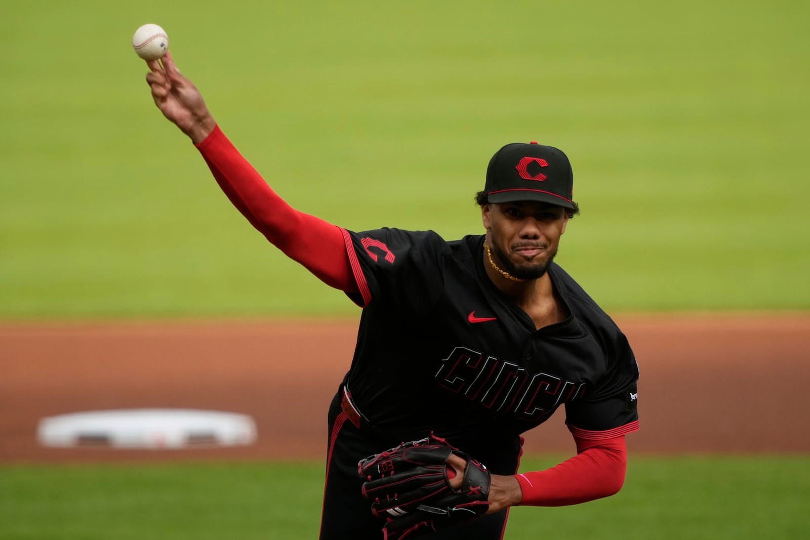 Cincinnati Reds pitcher Hunter Greene throws during the first inning of a baseball game against the Chicago Cubs, Friday, May 23, 2025, in Cincinnati. (AP Photo/Carolyn Kaster)