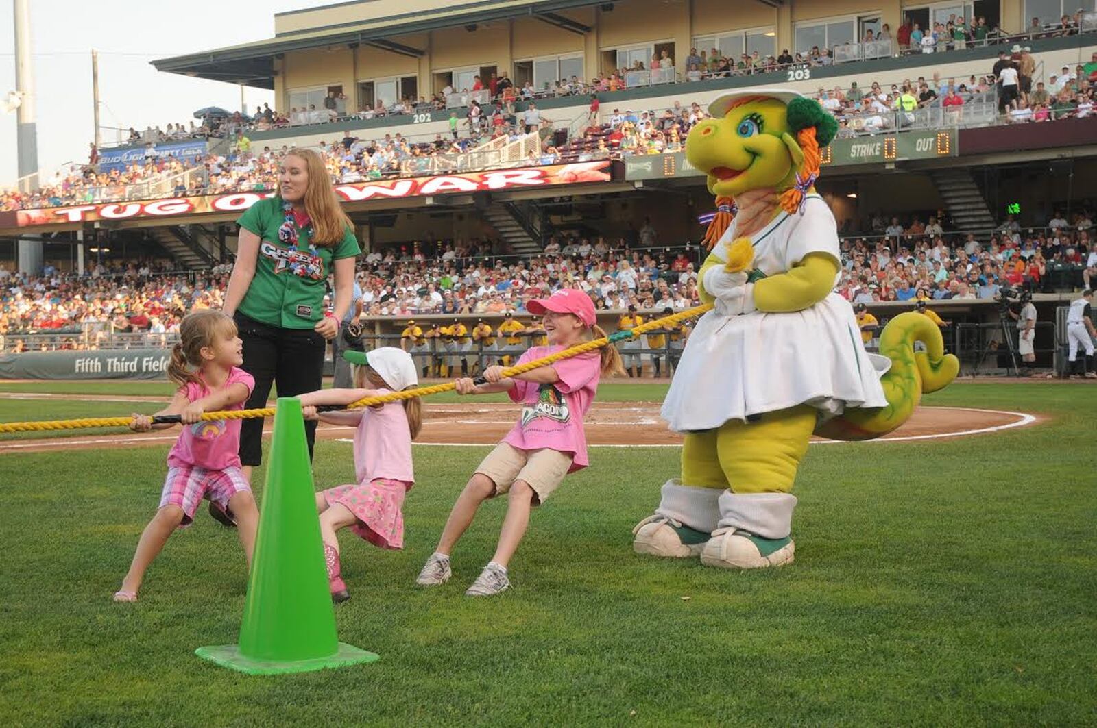 Members of the Dragons Green Team are the backbone of entertainment at Fifth Third Field, and are responsible for welcoming fans to the game, selecting fans for on-field skits including tug of war, dancing on the dugout, shooting T-shirts to fans and interacting with the Dragons’ mascots. CONTRIBUTED