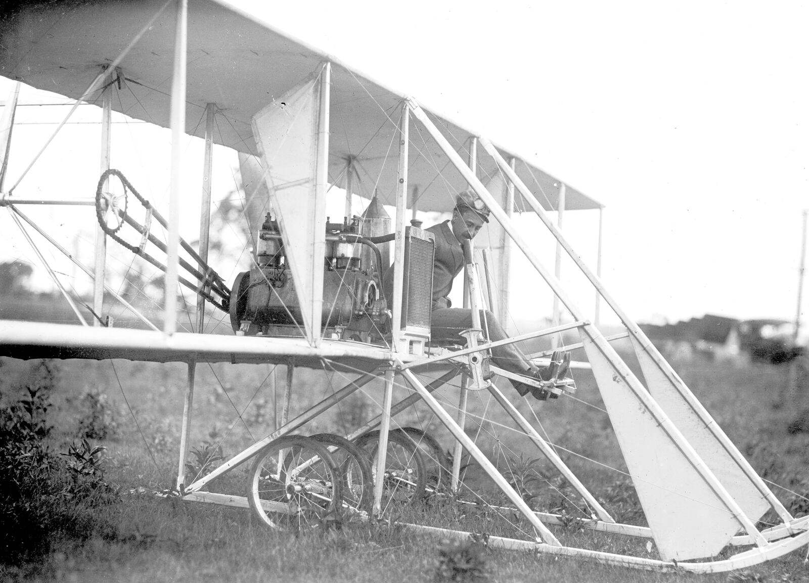 Orville Wright is at the controls of the Wright Model B in 1910 at Huffman Prairie.Photo by William Mayfield from the Marvin Christian Collection
