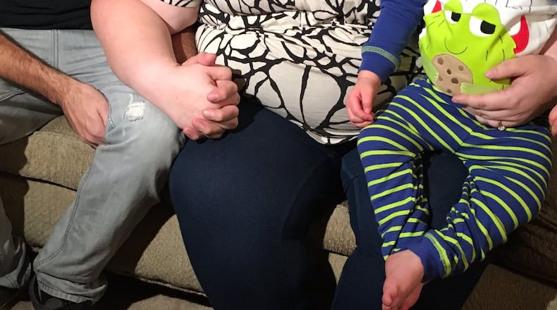 Jennah and Josh Strader of Beavercreek have faced challenges in raising their young family because of his status as a registered sex offender. The couple met when she was a 14-year-old freshman and he was a 19-year-old senior. KATIE WEDELL/STAFF