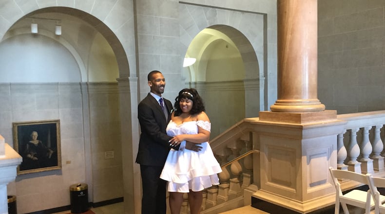 Brandon Cooper with his wife, Brittney Cooper. Brandon Cooper was shot and killed Wednesday morning while driving for Lyft. / CONTRIBUTED