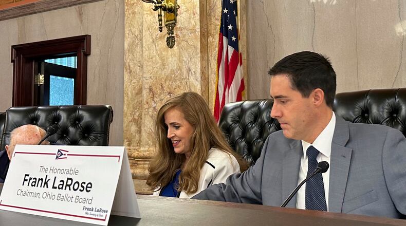 Ohio Secretary of State Frank LaRose, right, and state Sen. Theresa Gavarone prepare for a meeting of the Ohio Ballot Board at the Ohio Statehouse in Columbus, Ohio, Friday, Aug. 16, 2024. (AP Photo/Julie Carr Smyth)