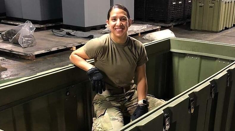 Staff Sgt. Jeanette Salgado, 445th Aeromedical Staging Squadron medical material journeyman, empties a bin of equipment for a week-long aeromedical and global patient movement exercise, Ultimate Caduceus, held at Wright-Patterson Air Force Base on April 28, 2021. CONTRIBUTED PHOTO