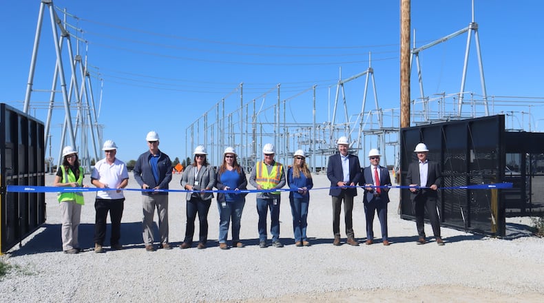 Preparing to cut the ribbon at the new AES Ohio Fayette substation in Jeffersonville. AES Ohio photo
