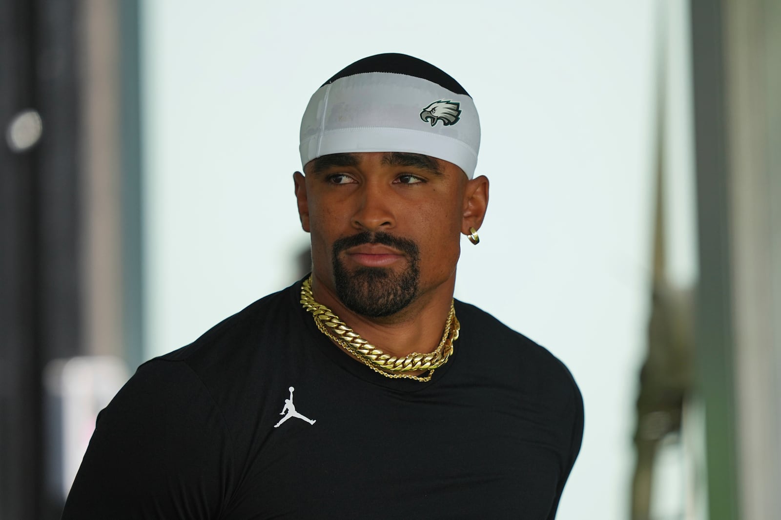 Philadelphia Eagles quarterback Jalen Hurts runs onto the field during an NFL football training camp, Wednesday, July 23, 2025, in Philadelphia. (AP Photo/Matt Rourke)