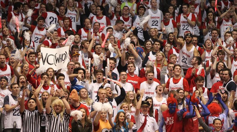 Fans in the student section cheer for Dayton during a game against Virginia Commonwealth on Saturday, March 5, 20126, at UD Arena in Dayton. David Jablonski/Staff