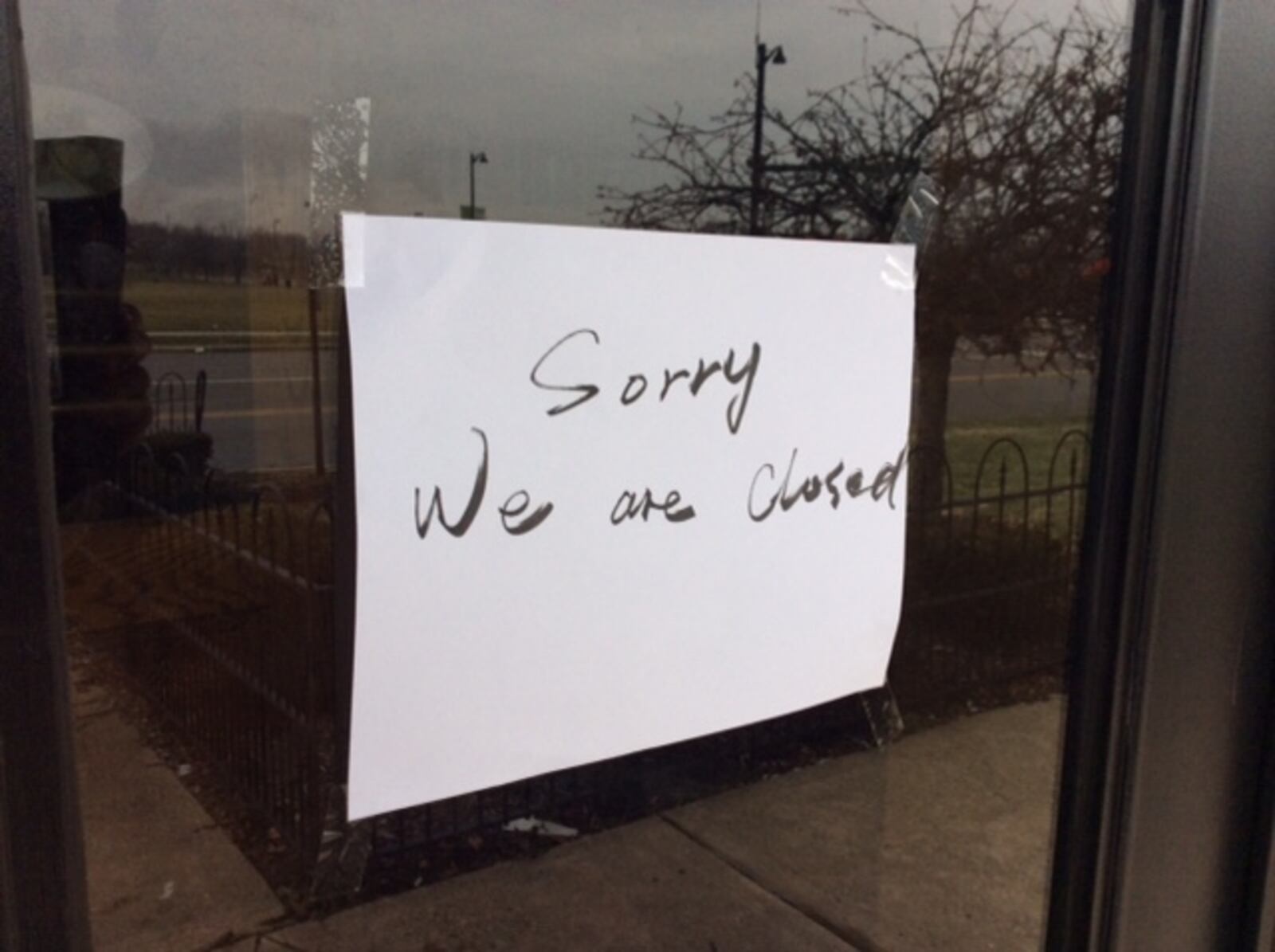 A hand-lettered sign reading “Sorry We are Closed” is taped to the front door of the Osaka Sushi & Hibachi Buffet restaurant at 8901 Kingsridge Drive behind the Dayton Mall. MARK FISHER/STAFF