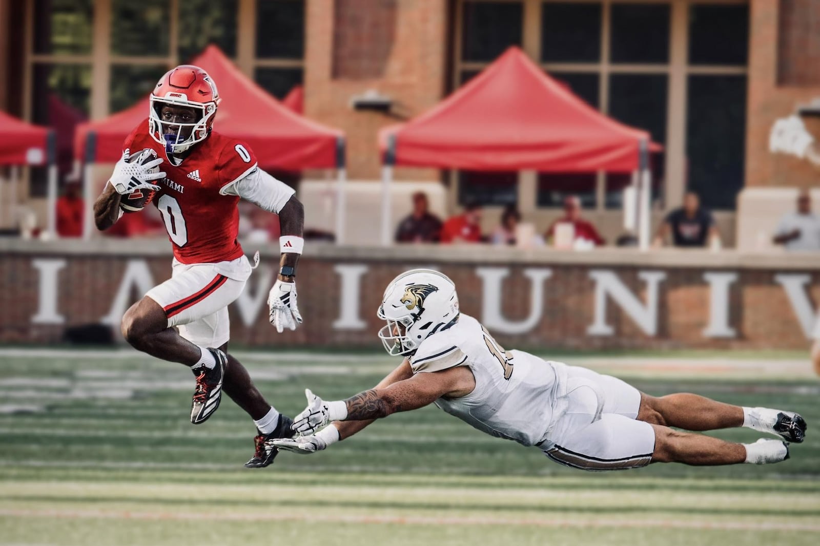 Miami's Keith Reynolds catches a pass during his game against Lindenwood last Saturday at Yager Stadium. JORDAN PHILLIPS / CONTRIBUTED