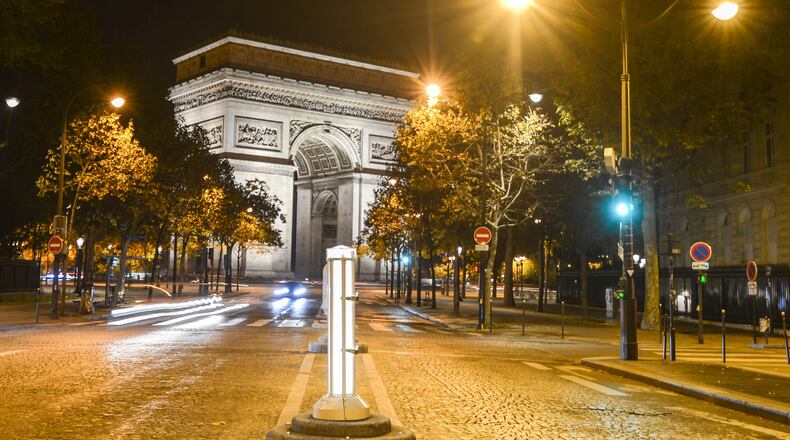 A nocturnal view of the Arc de Triomphe de Etoile, one of the most famous monuments in Paris. It stands in the centre of the Place Charles de Gaulle, seen from la plus belle avenue du monde Champs Elysees. (Artur Widak/Sipa USA/TNS)