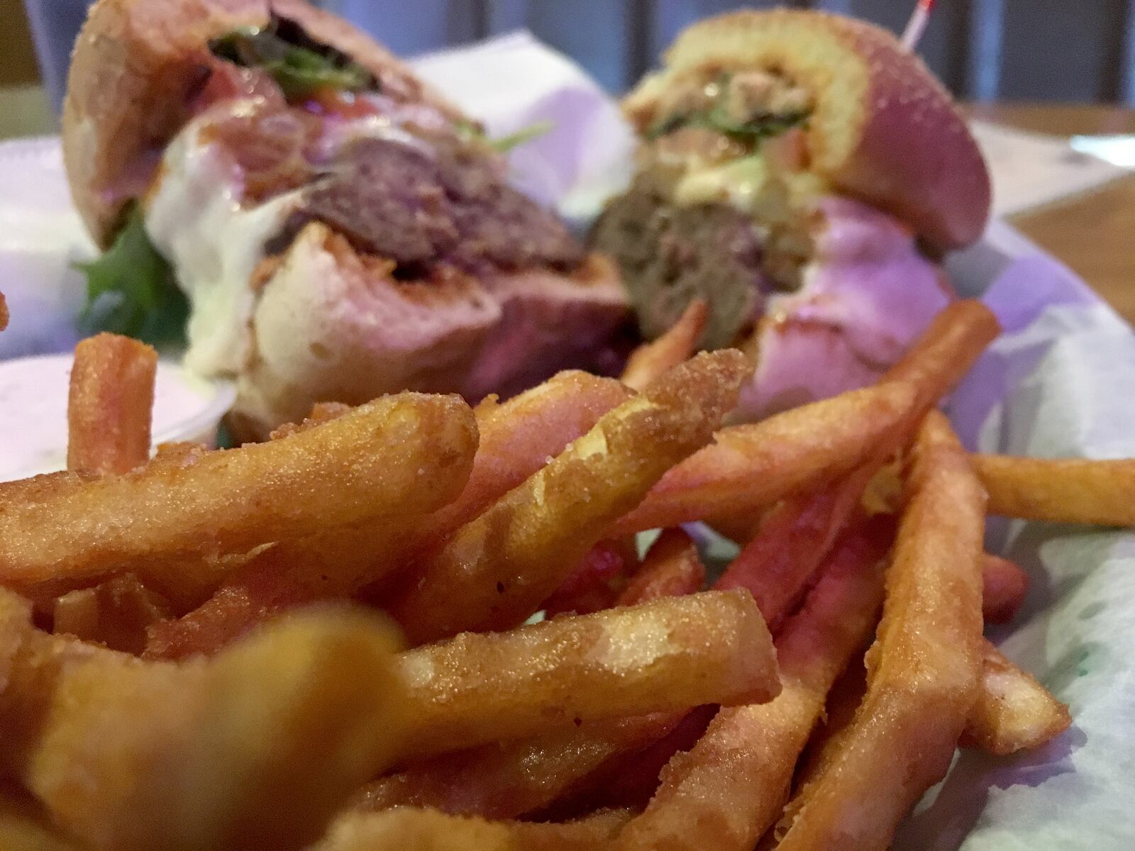 One Eyed Jack's will close permanently February 24. The restaurant's Bloomn' Onion burger and fries  are pictured.  Photo: Amelia Robinson
