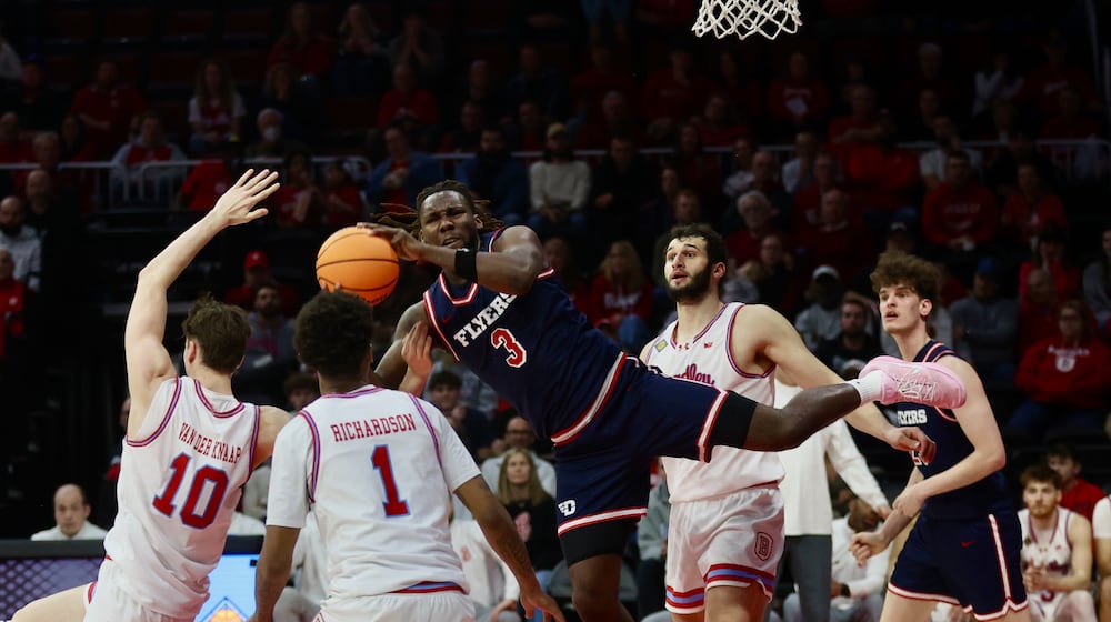 Dayton's Jaiun Simon draws a foul in the first half against Bradley in the first round of the National Invitation Championship on Wednesday, March 18, 2026, at Carver Arena in Peoria, Ill. David Jablonski/Staff
