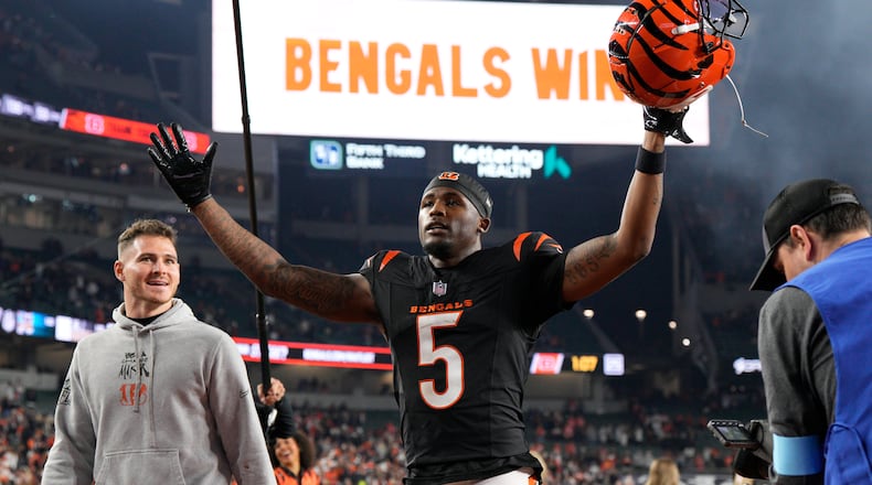 Cincinnati Bengals wide receiver Tee Higgins (5) celebrates after an NFL football game against the Denver Broncos in Cincinnati, Saturday, Dec. 28, 2024. (AP Photo/Jeff Dean)