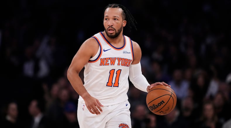 New York Knicks' Jalen Brunson (11) looks to pass during the first half of an NBA basketball game against the Orlando Magic Wednesday, Nov. 12, 2025, in New York. (AP Photo/Frank Franklin II)