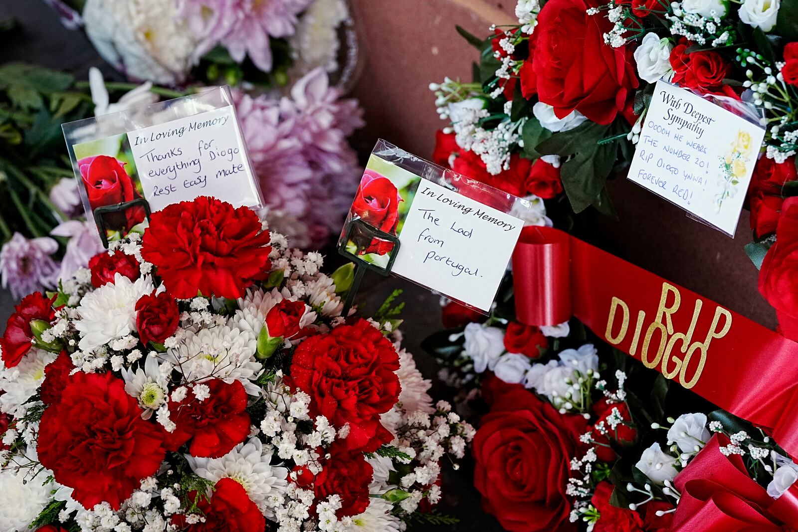 Tributes at Anfield Stadium, home of Liverpool, in memory of Liverpool player Diogo Jota, Thursday July 3, 2025. (Peter Byrne/PA via AP)