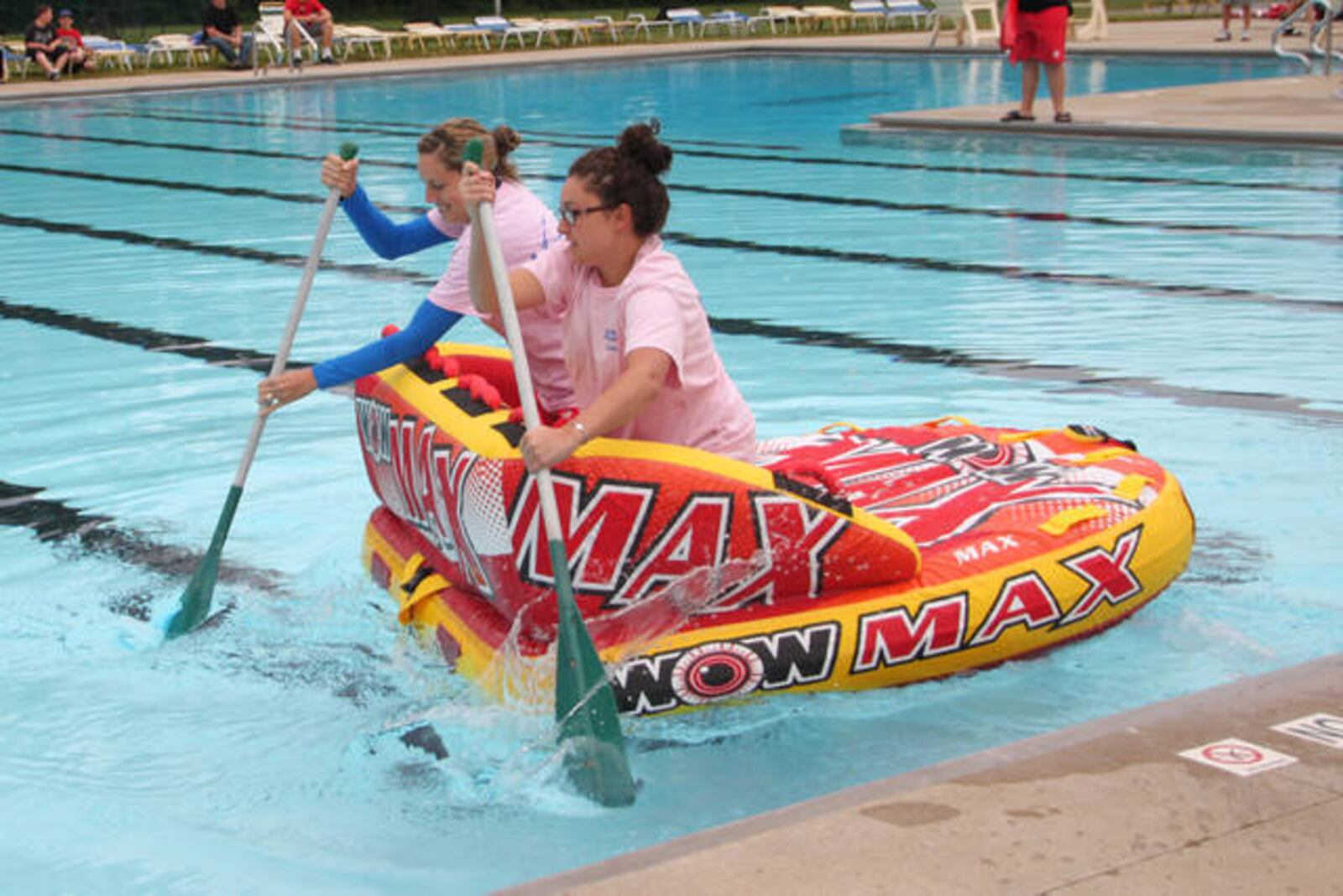 Kara Hamby and Nikki Speakman, employees of the City of Vandalia, compete in the Water Obstacle Course challenge.