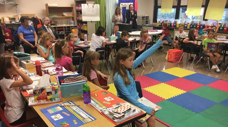 Beavercreek students work on a lesson during a visit from state superintendent Paolo DeMaria in 2017. JEREMY P. KELLEY / STAFF