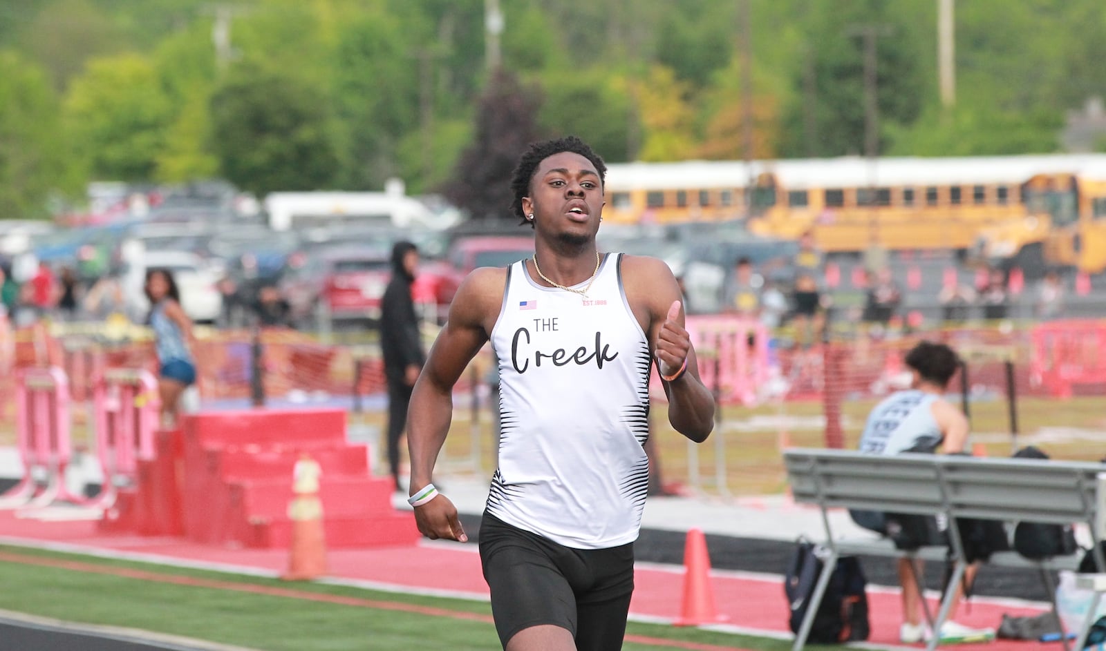 Beavercreek senior Kaden Ellerbe wins the 400 at the 2025 GWOC track meet at Heidkamp Stadium in Huber Heights on May 14.