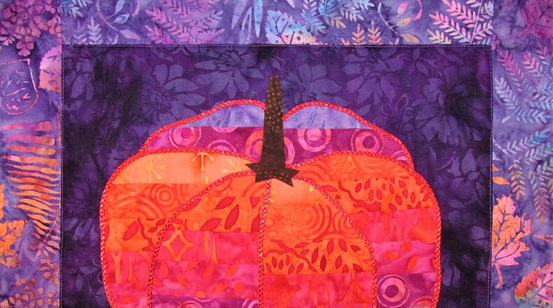 “Psychedelic Pumpkin” is part of Pam Geisel’s art quilt show at Village Artisans Gallery. CONTRIBUTED