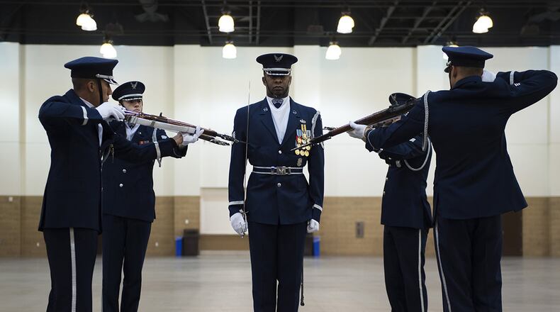 United States Air Force Honor Guard Drill Team performances feature a professionally choreographed sequence of show-stopping weapon maneuvers, precise tosses, complex weapon exchanges and a walk through the gauntlet of spinning weapons. The Drill Team members perform more than 100 times a year at various venues all over the world. (U.S. Air Force photo/Senior Airman Philip Bryant)