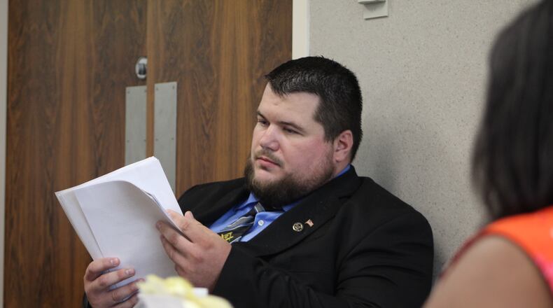 David Shaver testifies at his dimissal hearing. CORNELIUS FROLIK / STAFF