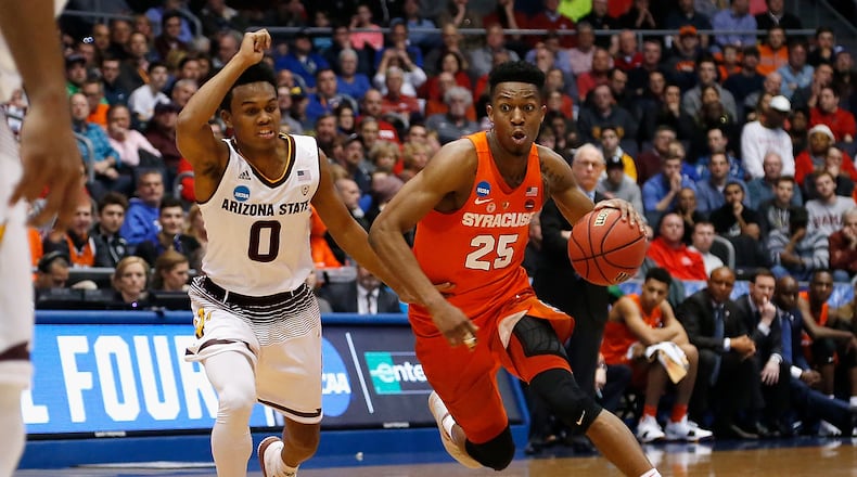 DAYTON, OH - MARCH 14: Tyus Battle #25 of the Syracuse Orange dribbles the ball against Tra Holder #0 of the Arizona State Sun Devils in the first half during the First Four of the 2018 NCAA Men’s Basketball Tournament at UD Arena on March 14, 2018 in Dayton, Ohio. (Photo by Kirk Irwin/Getty Images)