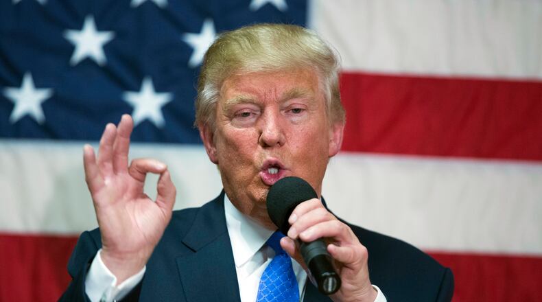 In this Oct. 6, 2016, photo, Republican presidential candidate Donald Trump speaks during a town hall in Sandown, N.H. Trump made a series of lewd and sexually charged comments about women as he waited to make a cameo appearance on a soap opera in 2005. The Republican presidential nominee issued a rare apology Friday, “if anyone was offended.” (AP Photo/ Evan Vucci)