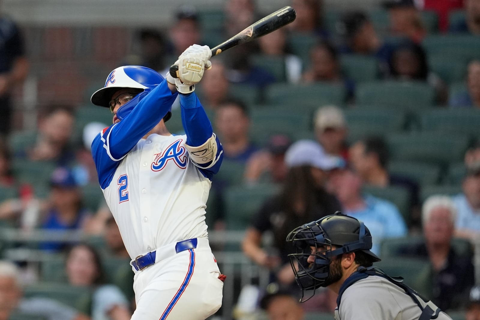 Atlanta Braves shortstop Nick Allen (2) hits an RBI-single in the fourth inning of a baseball game against the New York Yankees, Saturday, July 19, 2025, in Atlanta. (AP Photo/Mike Stewart)