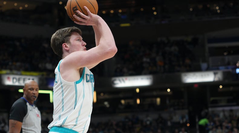 Charlotte Hornets guard Kon Knueppel shoots a 3-point shot against the Indiana Pacers during the first half of an NBA basketball game in Indianapolis, Thursday, Feb. 26, 2026. (AP Photo/AJ Mast)