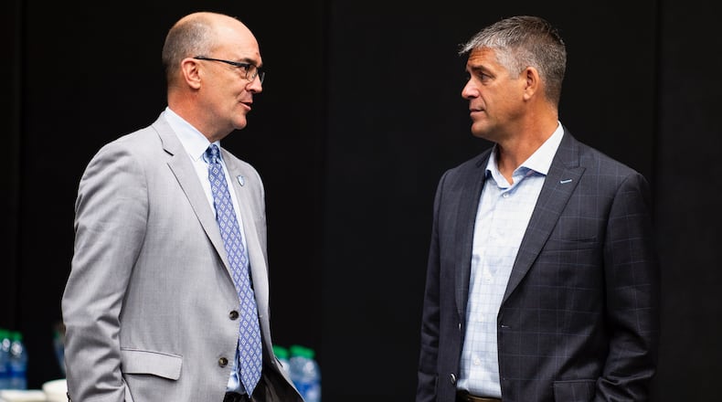 Duquesne Athletic Director Dave Harper, right, appears at A-10 Media Day on October 24, 2019 at Barclays Center, Brooklyn, New York.  (Photo by Mike Lawrence)