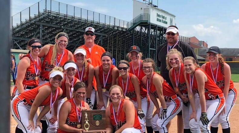 The Bradford High School softball team, shown with its regional championship trophy, plays in the program’s first state tournament when Bradford takes on Jeromesville Hilldale in the Division IV state semifinals Friday in Akron. CONTRIBUTED PHOTO