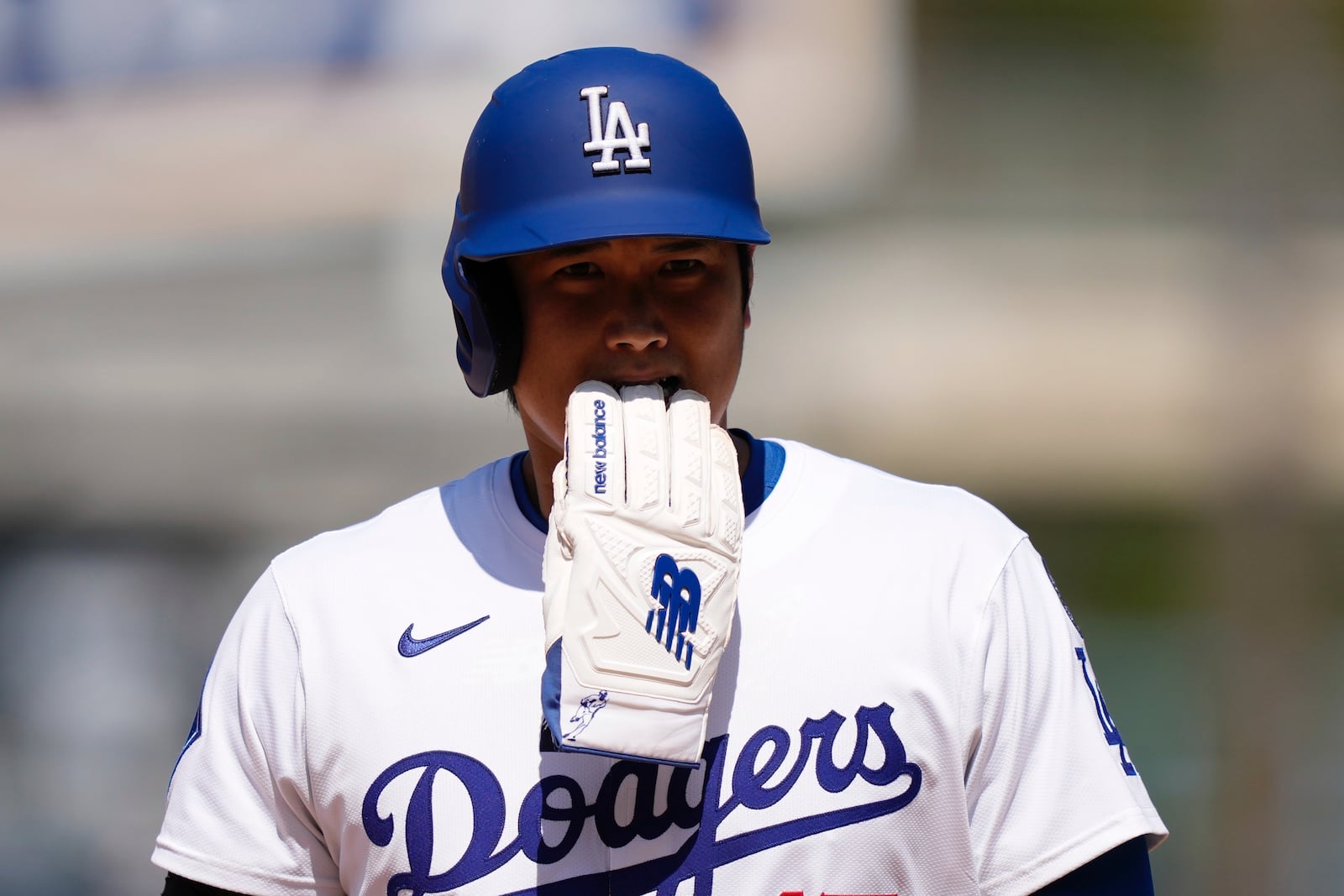 Los Angeles Dodgers' Shohei Ohtani walks off the field after eighth inning of a baseball game against the Milwaukee Brewers, Sunday, July 20, 2025, in Los Angeles. (AP Photo/Mark J. Terrill)