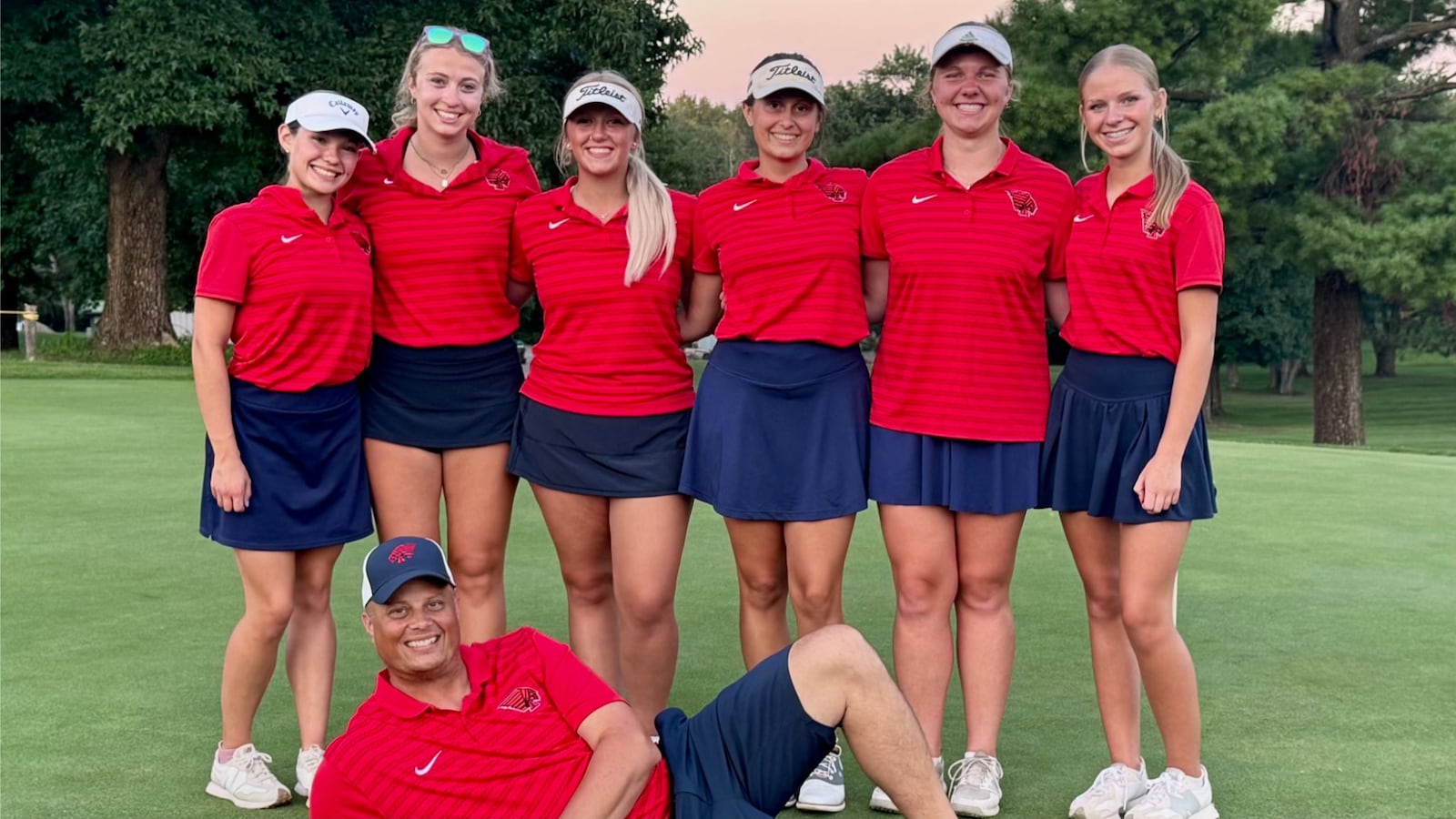The Piqua High School girls golf team smiles together on a golf course. BRAD KUHLMAN/CONTRIBUTED PHOTO