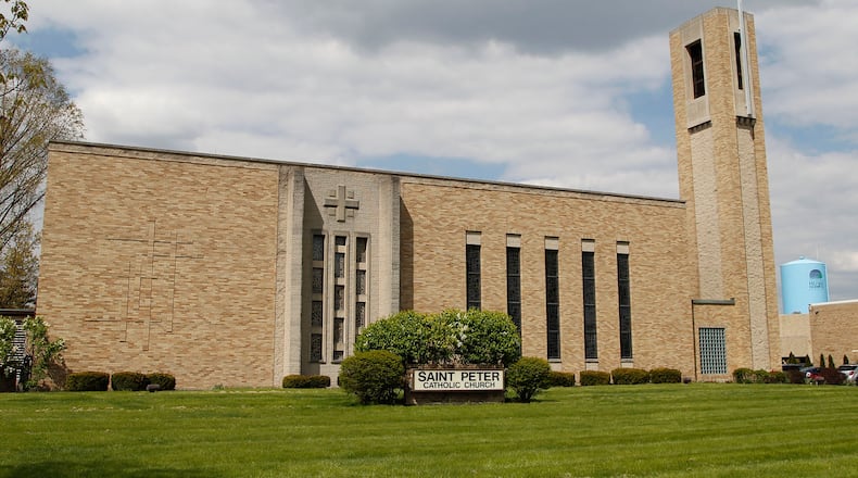 St. Peter Catholic Church in Huber Heights is one of several congregations offering free meals. TY GREENLEES / STAFF FILE