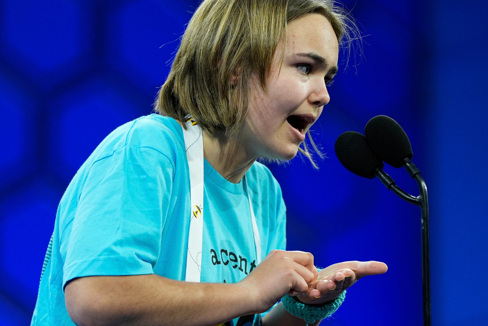 Leah Marie Rini, 13, of Plattsburgh, N.Y., competes in the first preliminary round of the Scripps National Spelling Bee, Tuesday, May 27, 2025, in Oxon Hill, Md. (AP Photo/Julia Demaree Nikhinson)