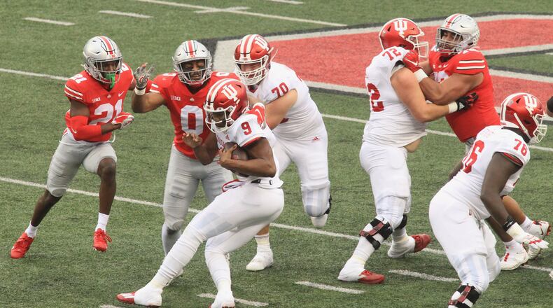Ohio State's Jonathan Cooper hits Indiana's Michael Penix on Saturday, Nov. 22, 2020, at Ohio Stadium in Columbus. David Jablonski/Staff