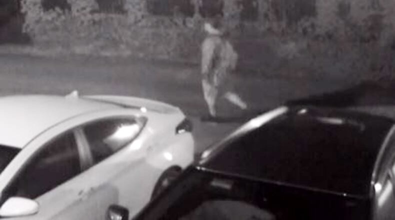 Surveillance video provided by the Dayton Police Department shows shooter Connor Betts walking east in the alley behind Newcom’s at 12:55 A.M. on Sunday, Aug. 4, with a heavy backpack about 10 minutes before he opened fire on East Fifth Street, killing nine and injuring more than two dozen. DAYTON POLICE DEPARTMENT