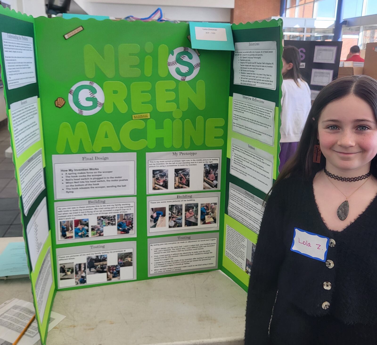 Prass Elementary School third-grader Lola Zimmer, of Kettering, created a device dubbed Neil’s Green Machine, which was a project for the school’s Invention Convention. CONTRIBUTED
