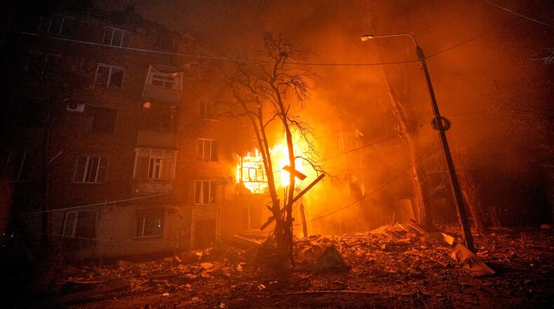 A residential building burns after a Russian strike in Kryvyi Rih, Ukraine, Thursday, Jan. 8, 2026. (AP Photo/Mykola Myrnyi)