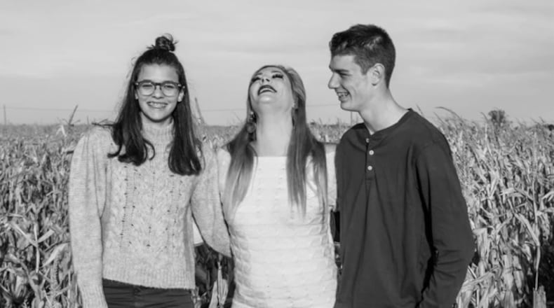 Ashley Nonnenman, center, with children Chanel Nonnenman and AJ Hess