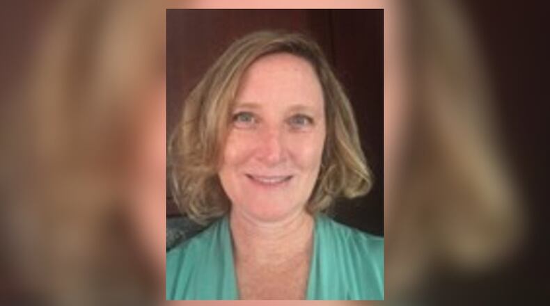 Joy McKarns, a language arts teacher at Northmont Middle School, won an award for her work with the Dayton Historical Aviation National Parks. CONTRIBUTED