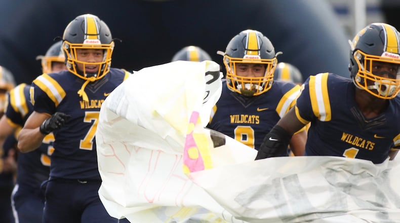 Springfield takes the field before a game against Lebanon on Friday, Sept. 21, 2018, at Evans Stadium in Springfield. David Jablonski/Staff